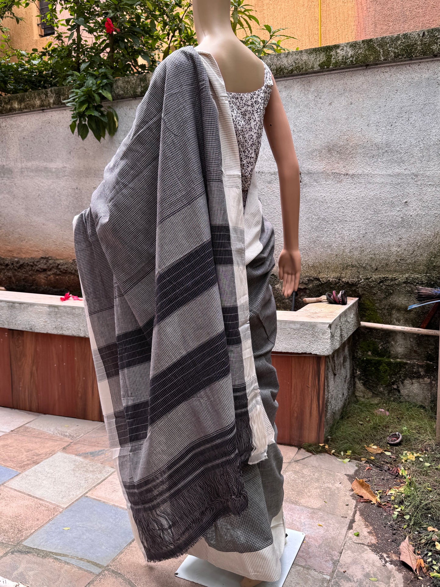 Handloom black checks with white border saree