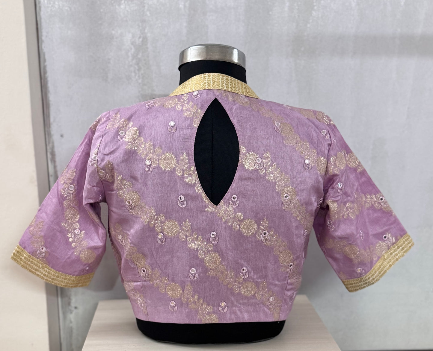 Purple blouse with gold embroidery