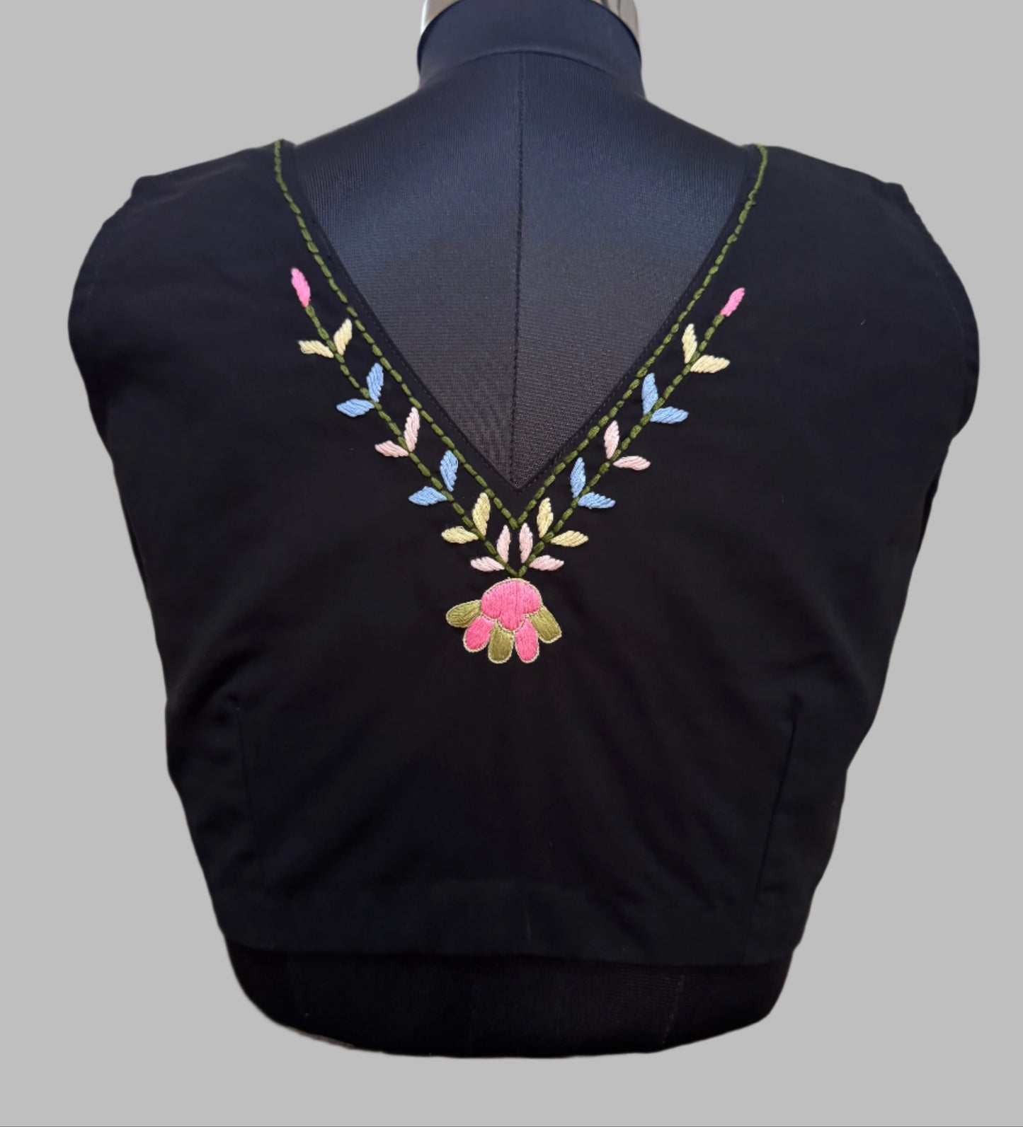 Black blouse with colorful floral embroidery