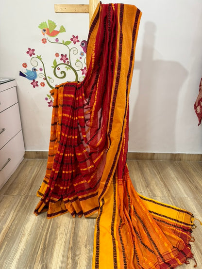 REKHA :BLACK AND RED COTTON SAREE WITH RUDRAKSHA MOTIF