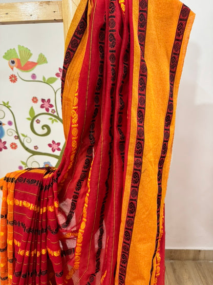 REKHA :BLACK AND RED COTTON SAREE WITH RUDRAKSHA MOTIF