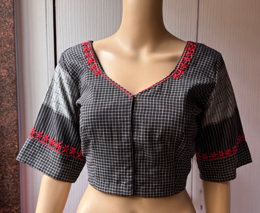 Black blouse with red embroidery