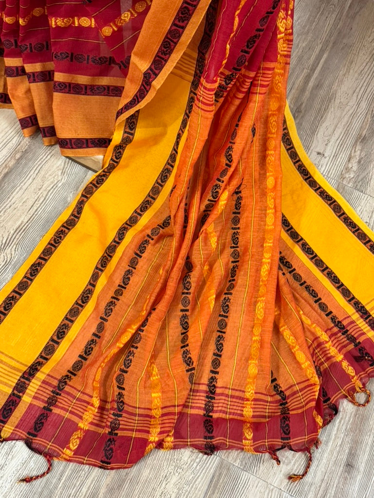 REKHA :BLACK AND RED COTTON SAREE WITH RUDRAKSHA MOTIF