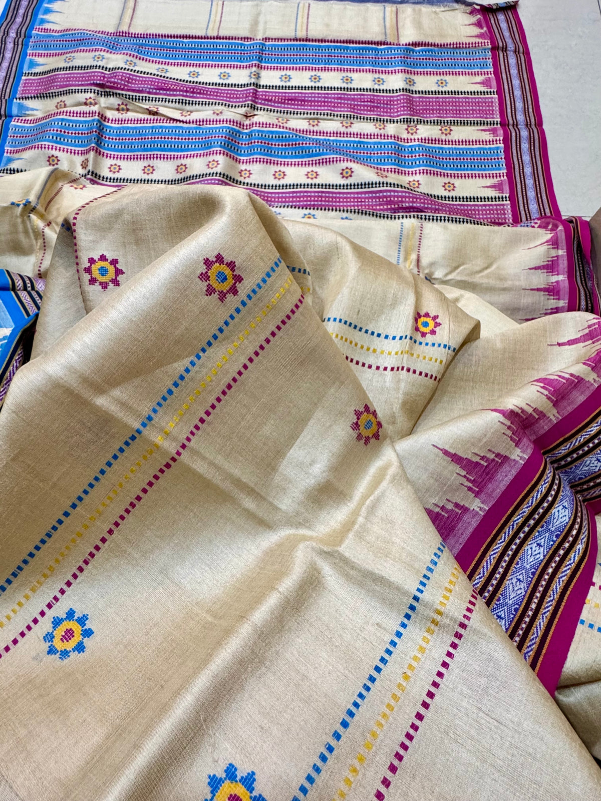KRIPA : KARVATI KINAAR TUSSAR SILK JHALA PALLA WITH VERTICLE WOVEN STRIPES, PINK AND BLUE BORDERS
