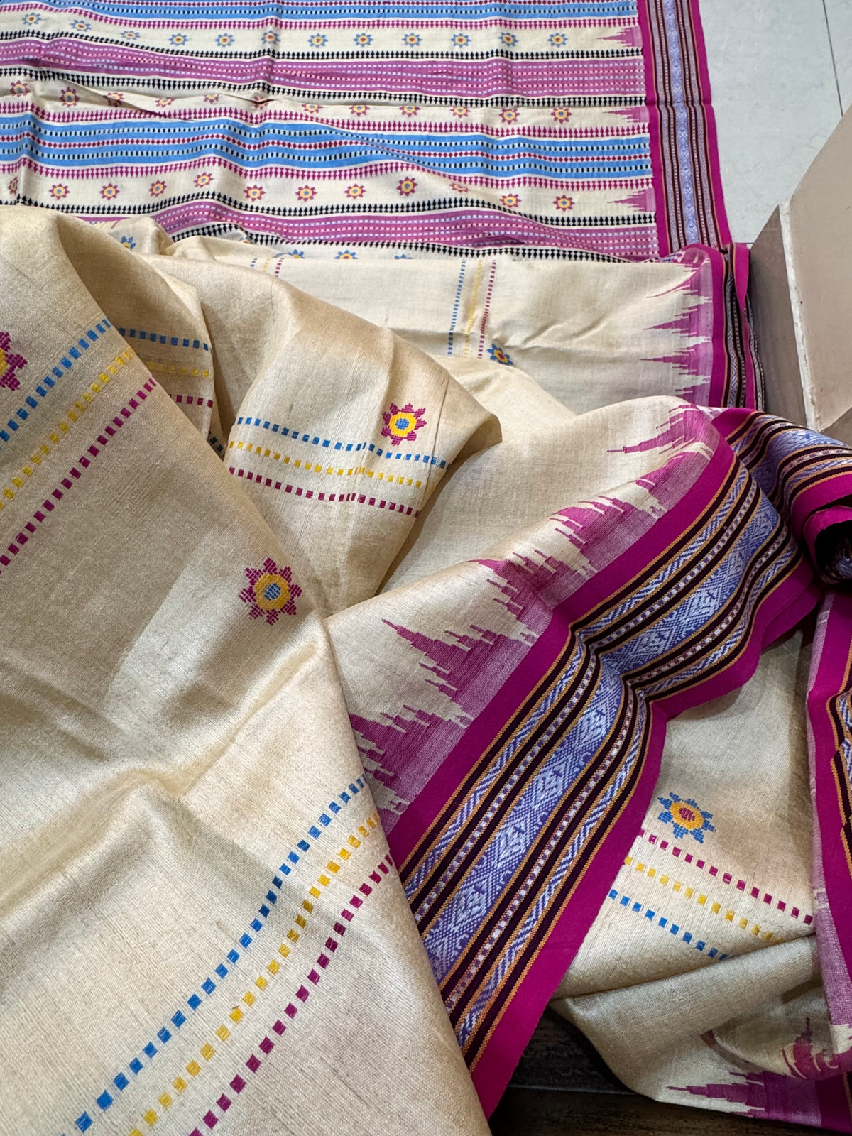 KRIPA : KARVATI KINAAR TUSSAR SILK JHALA PALLA WITH VERTICLE WOVEN STRIPES, PINK AND BLUE BORDERS
