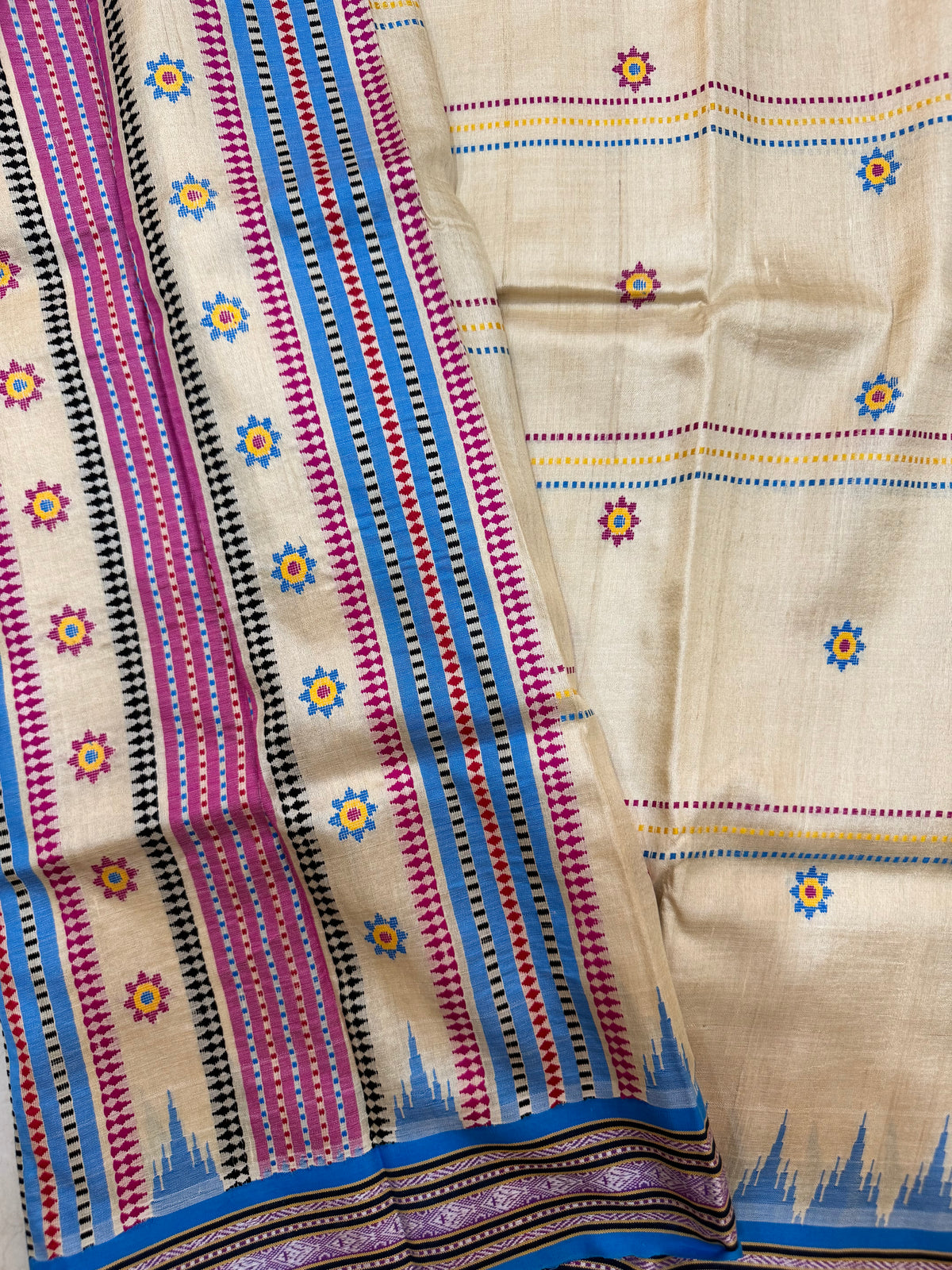 KRIPA : KARVATI KINAAR TUSSAR SILK JHALA PALLA WITH VERTICLE WOVEN STRIPES, PINK AND BLUE BORDERS