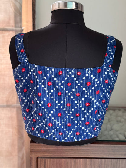 blue sleeveless blouse