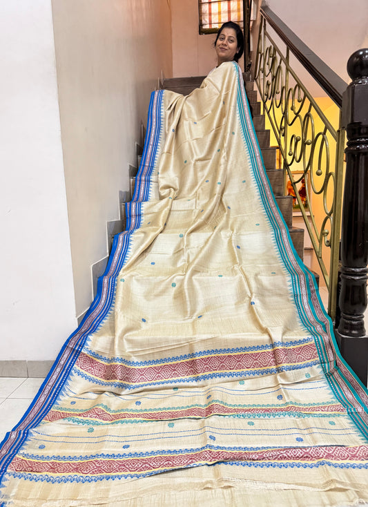 MRIDULA: KARVATI KINAAR TUSSAR SILK JHALA PALLA WITH AQUA BLUE BORDERS