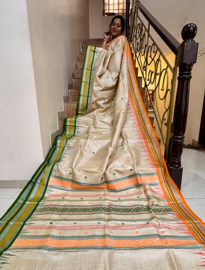 TANAYA : KARVATI KINAAR TUSSAR SILK JHALA PALLA WITH LIGHT-ORANGE AND GREEN  BORDERS