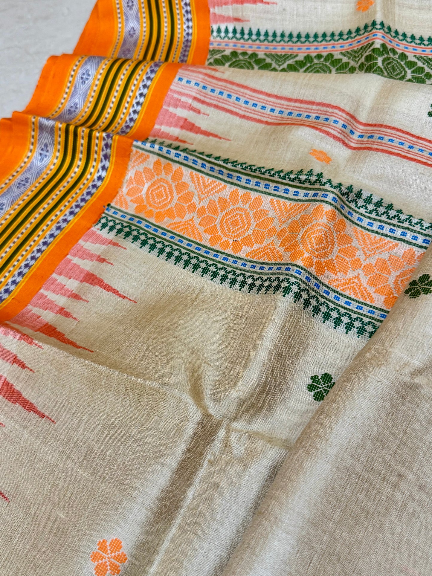 TANAYA : KARVATI KINAAR TUSSAR SILK JHALA PALLA WITH LIGHT-ORANGE AND GREEN  BORDERS
