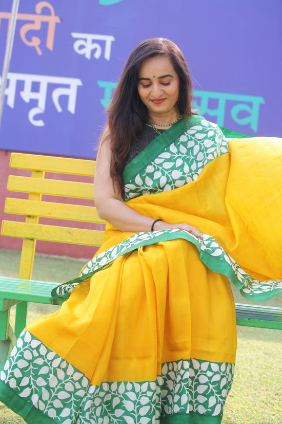 Yellow hand painted silk saree