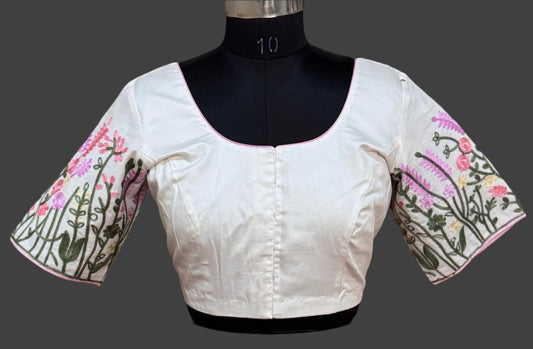 White blouse with floral sleeves