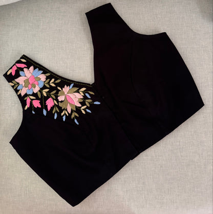 Black sleeveless blouse with floral embroidery 