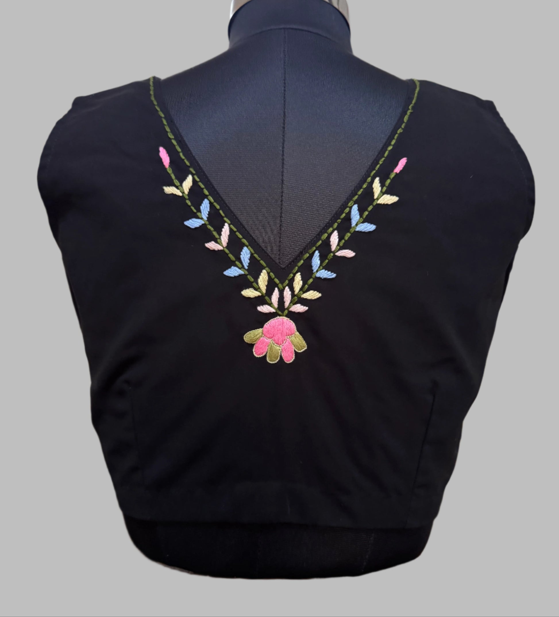 Black blouse with colorful floral embroidery
